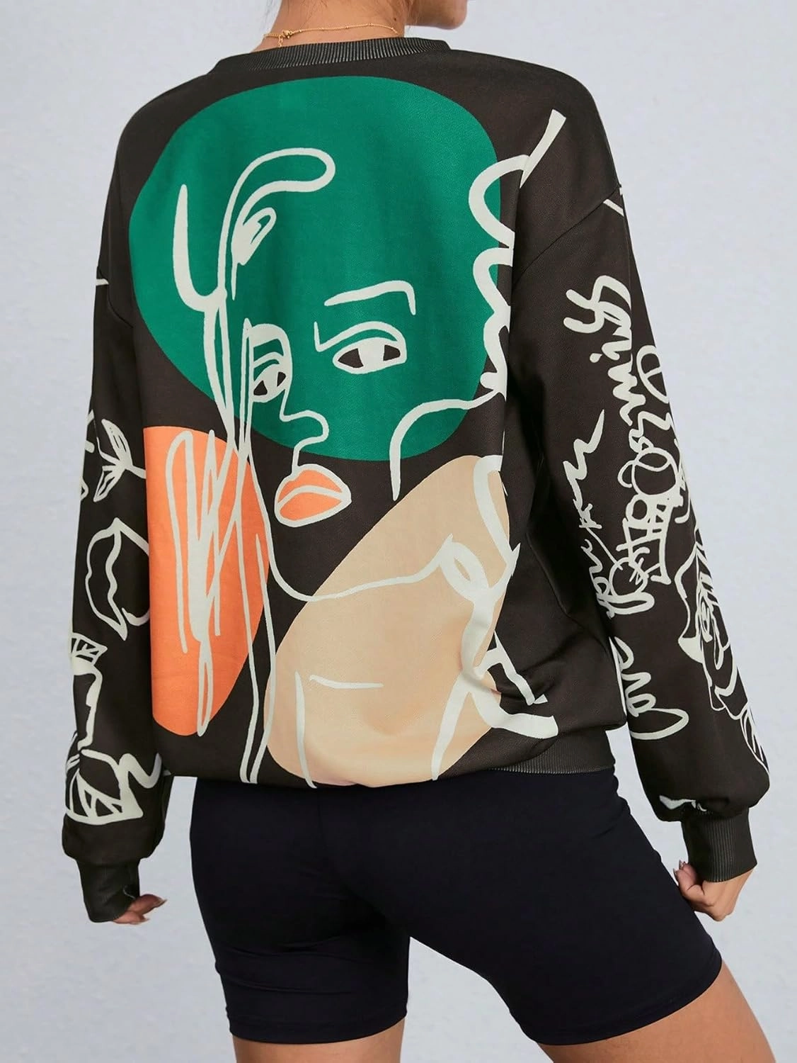 WDIRARA Women's Figure Graphic Print Sweatshirt Round Neck Long Sleeve Contrast Color Graffiti Pullovers