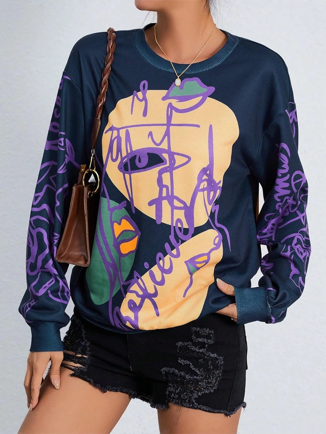 WDIRARA Women's Figure Graphic Print Sweatshirt Round Neck Long Sleeve Contrast Color Graffiti Pullovers